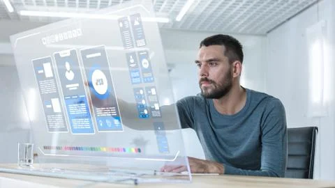 In the Near Future Stylish Man Using His High-Tech Computer with Transparent  Stock Photos