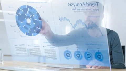 In the Near Future Successful Trader Using Computer with Transparent Display  Stock Photos
