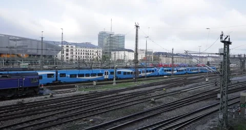 Near Hackerbrücke Bridge View with Train and City Skyline – Munich 4K 100fps Stock Footage 319299537
