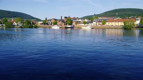 Near a small river with a beautiful view of the city Stock Footage 155186868