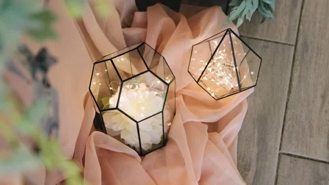 Near the table at the celebration there is a decor that illuminates Stock Footage 295890865