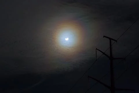 Near total eclipse of the Sun. The moon covers the sun in a solar eclipse  Stock Photos