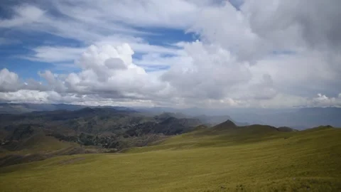 Nearby mountain range with cloudy sky in the background Stock Footage 274513008