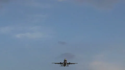 Nearest aircraft flight on a background of clear sky Stock Footage 41972793