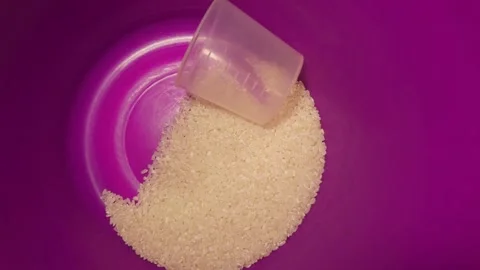Nearly Empty Rice Container with Measuring Cup at Home Stock Footage 344670016