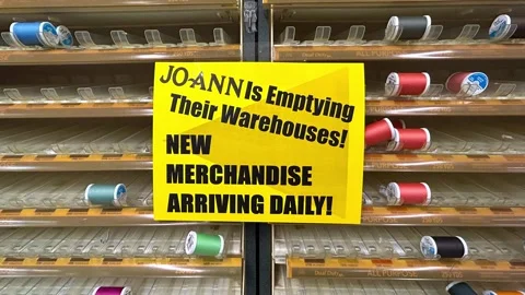 Nearly empty thread display in a  Joann Fabrics store Stock Footage 303283517