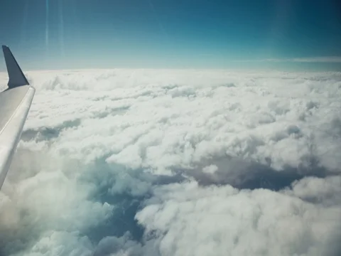 Neat clouds from the airplane window Stockbeeldmateriaal 81531445