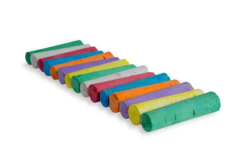 Neat diagonal row of colored chalks Stock Photos