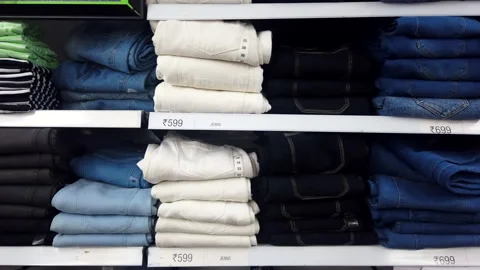 A neat display of folded jeans pants Stock Footage 267036744