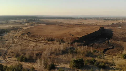 Neat sealed solid waste landfill in sunlight Stock Footage 106076184
