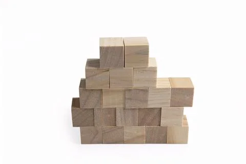 A neat stack of rough wooden cubes 写真素材