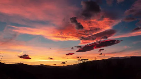 Neat Timelapse Of A Sunset With Lenticular Clouds  4K ProRes 4444 Stock Footage 310452779