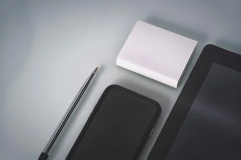 Neatly arranged tablet computer and smart phone manager's workplace Stock Photos