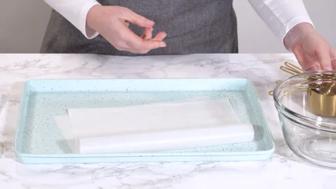 Neatly Fitting Parchment in Baking Dish Stock Footage 312468229