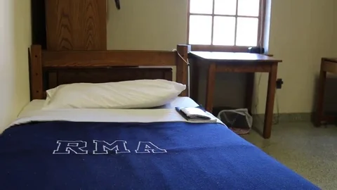 Neatly Made Student Bed in Dorm Room Stock Footage 69231606