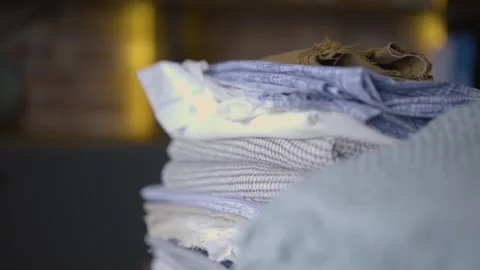 Neatly Stacked- Close-Up of Folded Fabrics and Towels, Neatly Folded, Stock Footage 287643937
