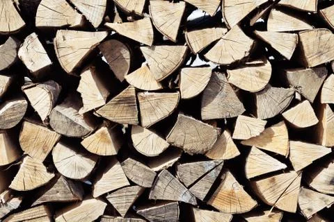Neatly stacked cut and split spruce tree firewood viewed from front Stock Photos