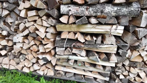 Neatly Stacked Split Firewood Logs Drying Outdoors Stock Footage 346787930