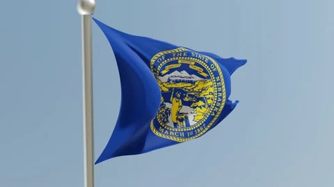 Nebraska flag on flagpole. NE flag fluttering in the wind. USA. Stock Footage 170570193