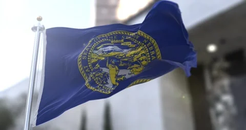 Nebraska flag waving-seamless-loop-4k-60fps Stock Footage 345161456