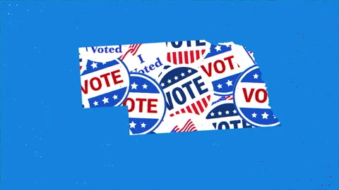 Nebraska State Map Filled with Vote Stickers on Blue Background Stock Footage 344339993