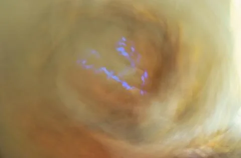 Nebulous vortex with electrical phenomenon Stock Photos