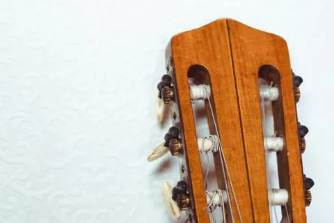 The neck of the guitar to the wall Stock Photos