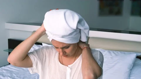 Neck pain. Back problems. Portrait of a young Caucasian woman massaging her Vídeo Stock 224768400