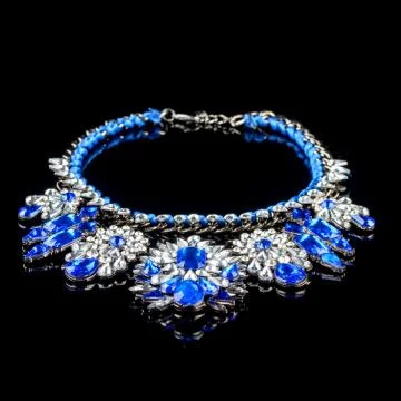 Necklace on a black background Stock Photos