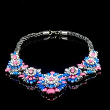 Necklace on a black background Stock Photos