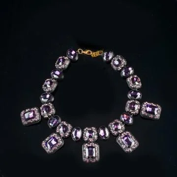 Necklace on a black background Stock Photos