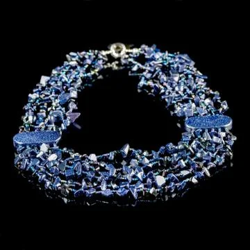 Necklace on a black background Stock Photos