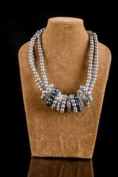 Necklace on a black background Stock Photos