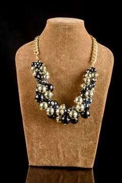 Necklace on a black background Stock Photos