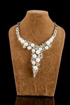 Necklace on a black background Stock Photos