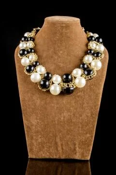 Necklace on a black background Stock Photos