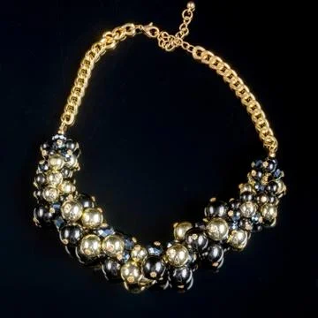Necklace on a black background Stock Photos