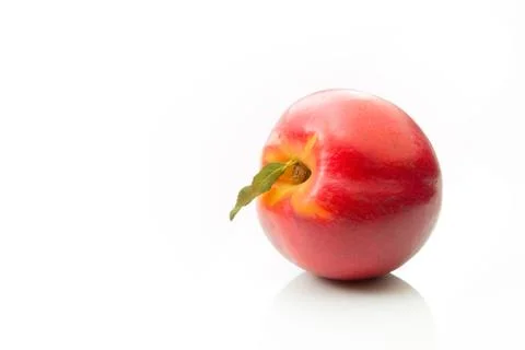Nectarine on its side on a white background. Stock Photos