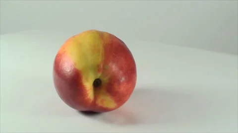 Nectarine Rotating On A White Surface, Fruit, Dessert, Delicious, Bio Stock Footage 40616945