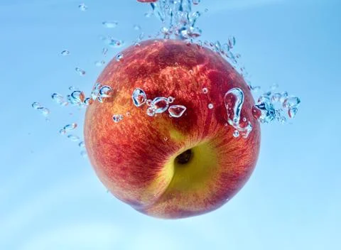 Nectarine in water Stock Photos