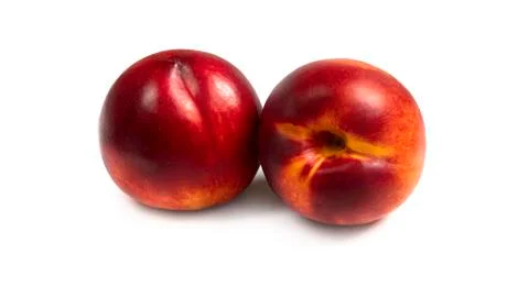 Nectarine on a white background from different sides. Macro photo. Stock Photos