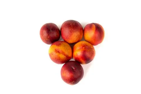 Nectarines triangle group on white background Stock Photos