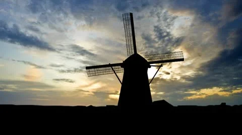 Nederland Kinderdijk windmill sunset clouds Stock Footage 10720626