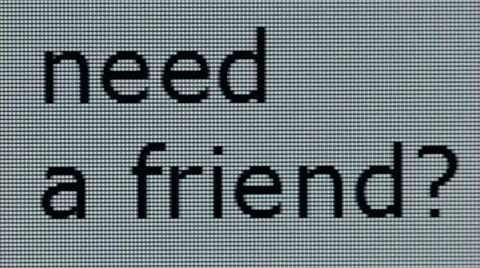 'need a friend?' typed on a computer screen in close-up Video stock 55484263