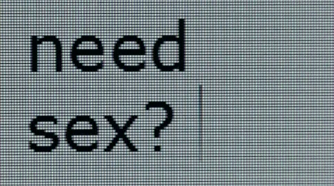 "Need sex?" typed on computer screen, individual pixels visible Video stock 54774459