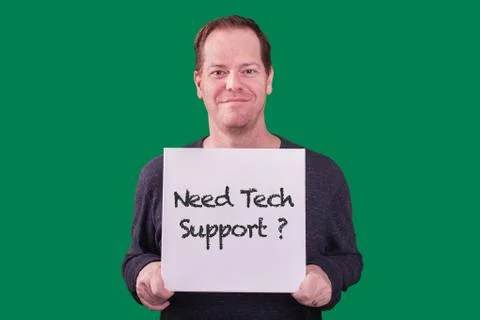 Need Tech Support? sign held by male model on green screen Stock Photos