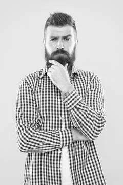 Needing a barber to shape the beard. Bearded man thinking of visiting barber Stock Photos