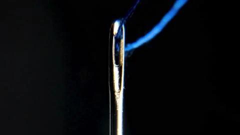 Needle and blue thread Stock Footage 177506009