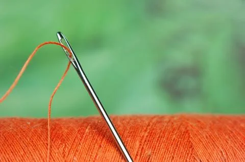 Needle and bobbin thread Stock Photos