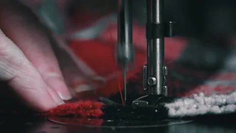 Needle and Foot of the Sewing Machine Penetrate the Fabric Close-up Stock Footage 229491158